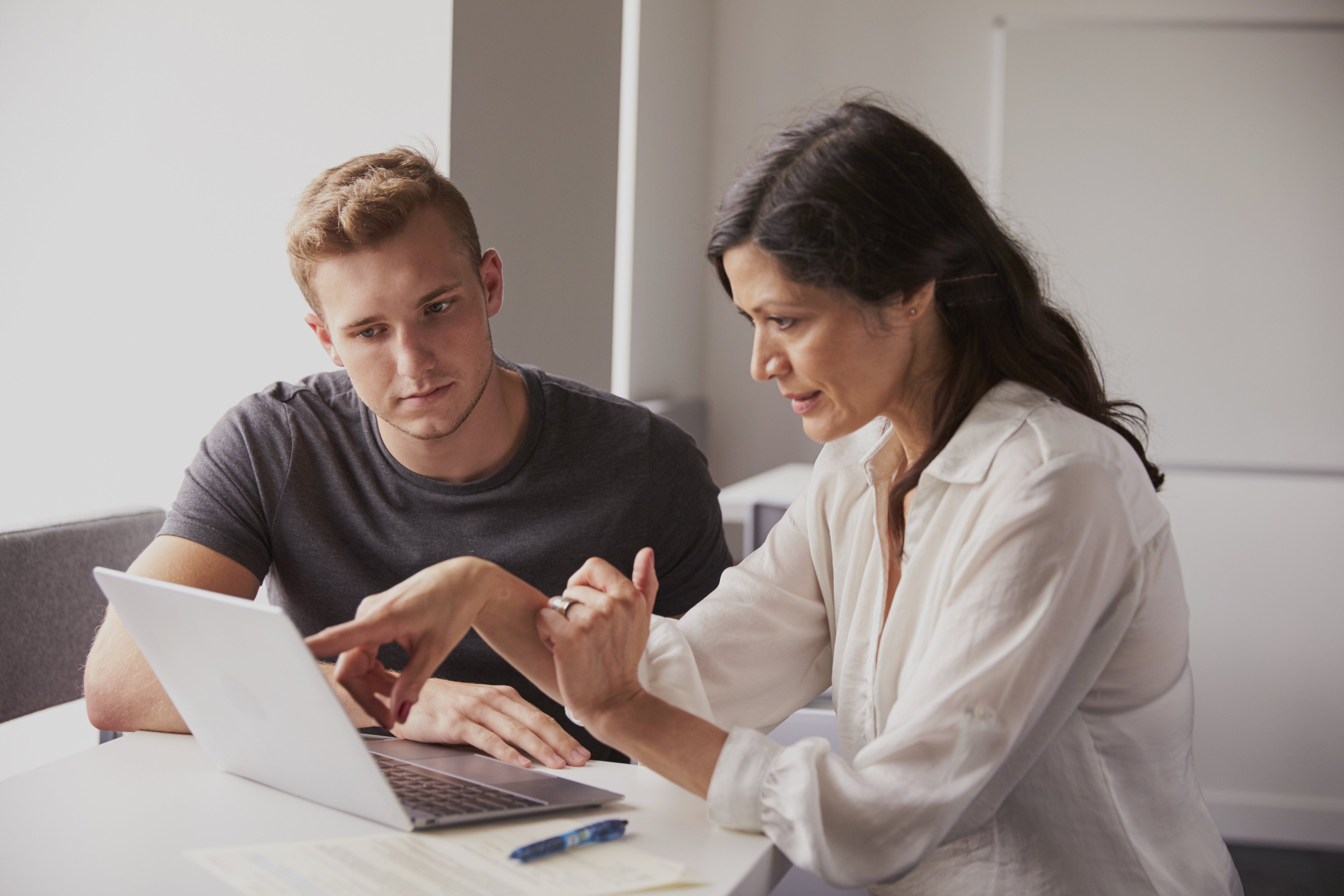 A man and a woman having a meeting