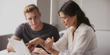 A man and a woman having a meeting