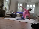 Photograph of Alison doing yoga for advert